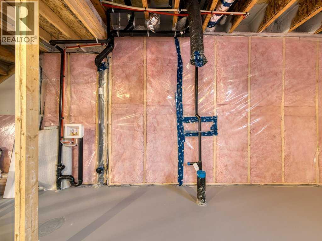 105 Creekstone Manor Sw, Calgary, Alberta  T2X 5W5 - Photo 32 - A2297741