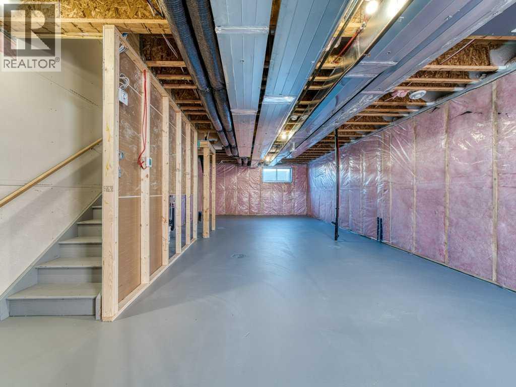 105 Creekstone Manor Sw, Calgary, Alberta  T2X 5W5 - Photo 31 - A2297741