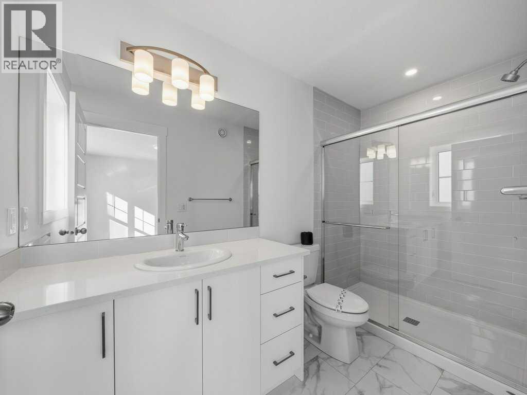 105 Creekstone Manor Sw, Calgary, Alberta  T2X 5W5 - Photo 22 - A2297741