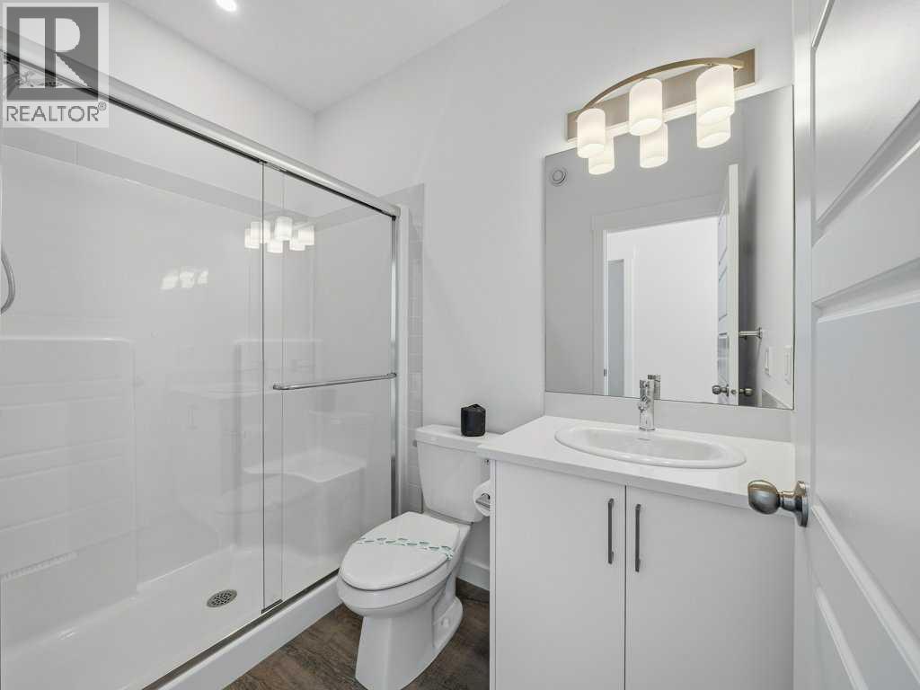 105 Creekstone Manor Sw, Calgary, Alberta  T2X 5W5 - Photo 14 - A2297741