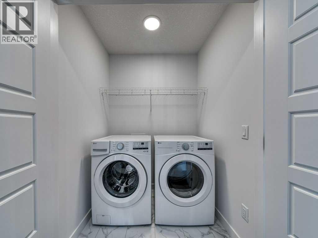 105 Creekstone Manor Sw, Calgary, Alberta  T2X 5W5 - Photo 29 - A2297741