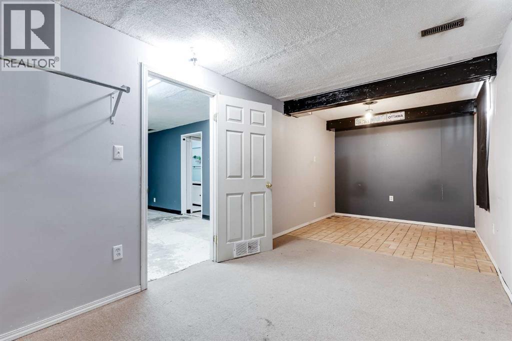 21 Mountain Circle Se, Airdrie, Alberta  T4A 1X8 - Photo 33 - A2299433