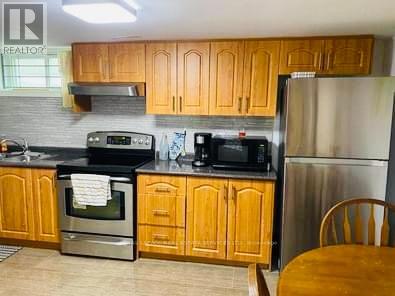 Bsmt - 79 Cultra Square, Toronto, Ontario  M1E 2E1 - Photo 6 - E12997064