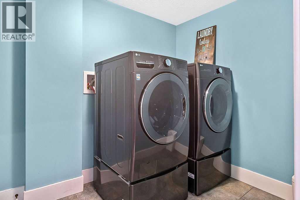 605 Sunrise Close, Diamond Valley, Alberta  T0L 2A0 - Photo 38 - A2276075