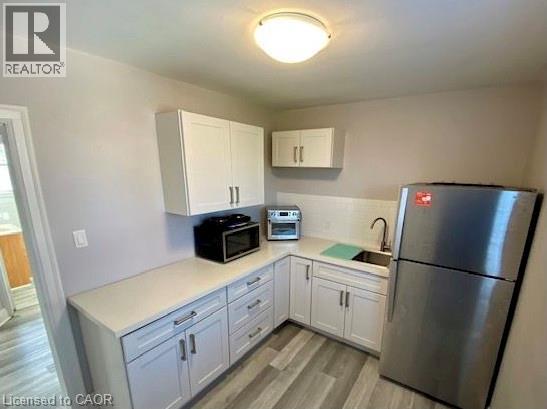 18 Cameron Avenue S Unit# Upper, Hamilton, Ontario  L8K 2W8 - Photo 4 - 40817198