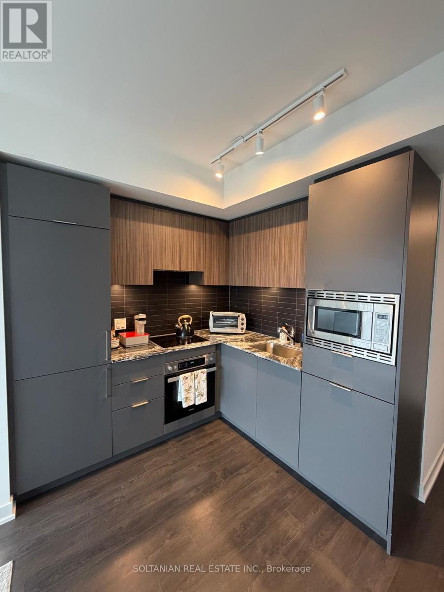 1220 - 20 O Neill Road, Toronto, Ontario  M3C 0R2 - Photo 4 - C13000856