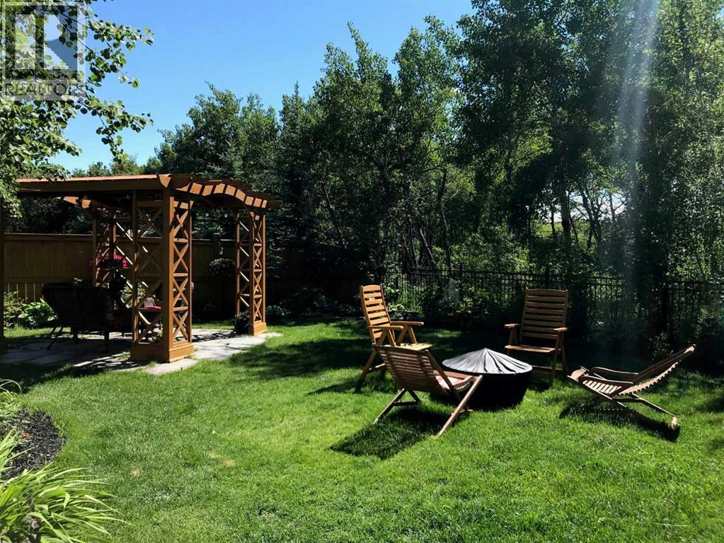 103 West Coach Way Sw, Calgary, Alberta  T3H 0M8 - Photo 2 - A2299376