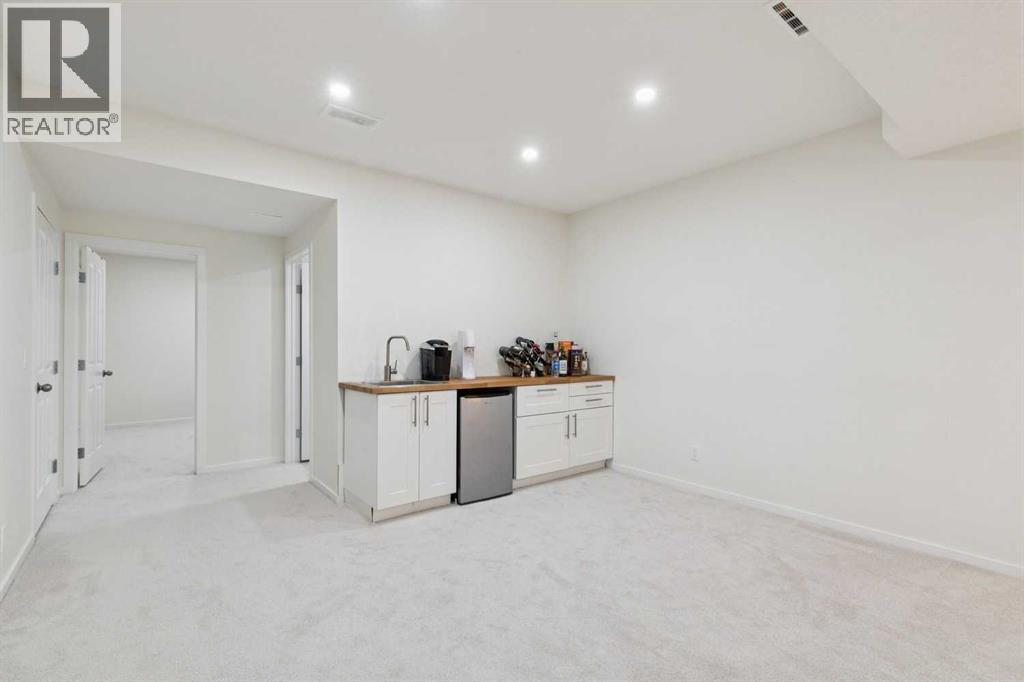 103 West Coach Way Sw, Calgary, Alberta  T3H 0M8 - Photo 37 - A2299376