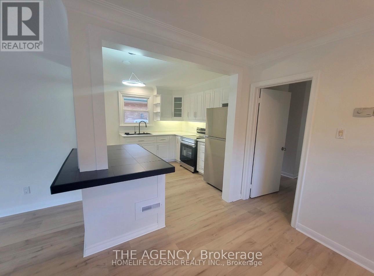 Main Floor - 26 Beaverbrook Avenue, Toronto, Ontario  M9B 2M9 - Photo 5 - W12989644