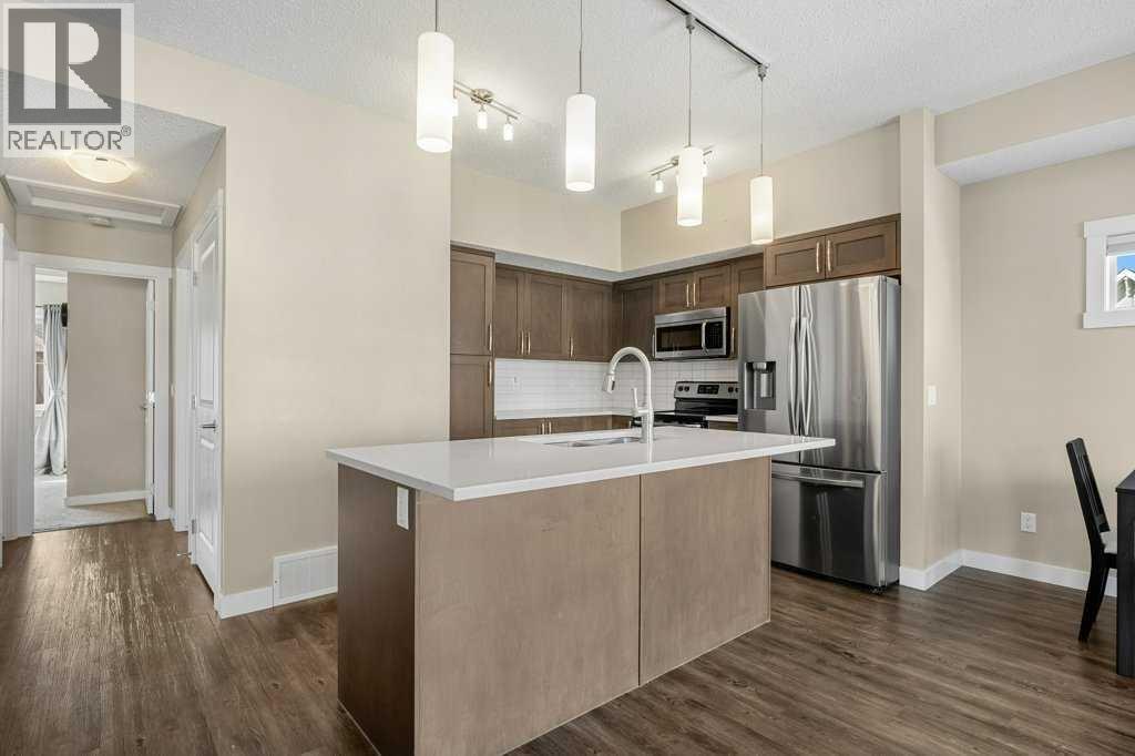 1102, 1225 Kings Heights Way Se, Airdrie, Alberta  T4A 0T7 - Photo 4 - A2299419