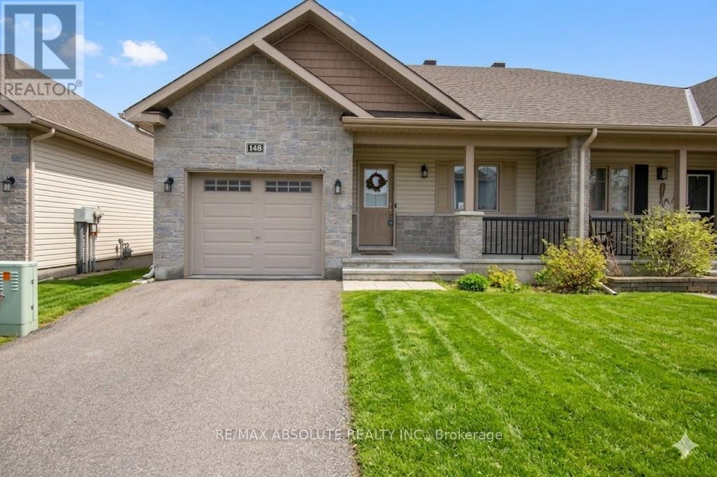 Welcome to 148 Equinox Drive, in the heart of Embrun, where comfort, convenience, and community come together. From your backyard, enjoy subtle views of the Castor River, adding a peaceful country feel while remaining within walking distance to local amenities. This gorgeous semi-detached home offers beautiful curb appeal with its stone and vinyl exterior, setting the tone for the quality and warmth found inside. Step into a bright, open-concept layout designed for easy living. Near the entrance, you'll find a well-positioned secondary bedroom and a 3-piece bathroom - ideal for guests, a home office, or flexible use. Hardwood and ceramic flooring add both style and durability throughout the main areas. The kitchen is functional and inviting, featuring generous counter space, ample cabinetry, and a practical island that doubles as additional seating. It flows seamlessly into the combined dining and living area, creating an ideal space for entertaining or everyday comfort. Patio doors lead to the fully fenced backyard, where peaceful surroundings enhance the country-style atmosphere. To complete the main floor, you'll find a spacious primary bedroom with a walk-in closet. Just steps away is a 4-piece bathroom, which conveniently includes a closet housing the laundry area for added practicality. The unfinished basement offers a den/office, the rest of the basement is a blank canvas, ready for your personal touch - whether you envision extra living space, a home gym, or a recreation room. Residents also can enjoy access to community amenities, including a gym, party/meeting room, recreation room, and a beautiful tennis court, outdoor gazebo, and BBQ. This also includes road maintenance and garbage. A wonderful opportunity to enjoy low-maintenance living with a touch of country charm in one of Embrun's most desirable neighbourhoods. (id:48254)