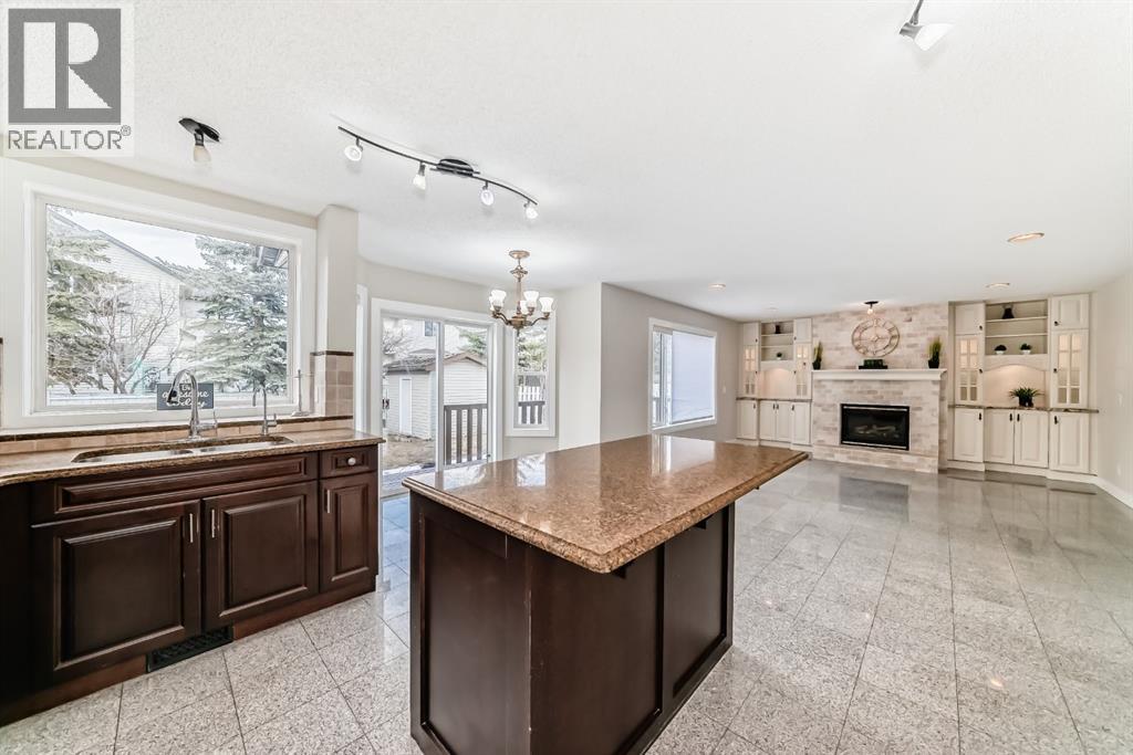 311 Rocky Ridge Cove NW, Calgary, Alberta T3G 4K1 - Photo 12 - A2300845