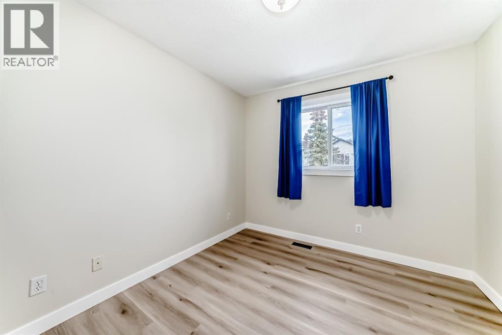 311 Rocky Ridge Cove NW, Calgary, Alberta T3G 4K1 - Photo 28 - A2300845