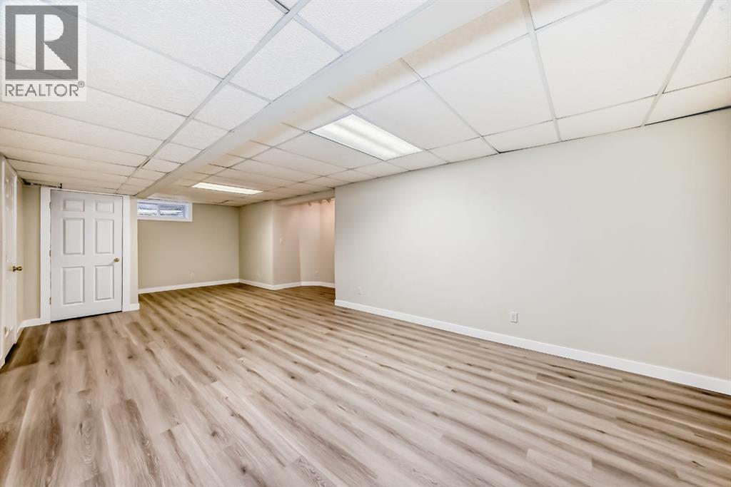 311 Rocky Ridge Cove NW, Calgary, Alberta T3G 4K1 - Photo 33 - A2300845