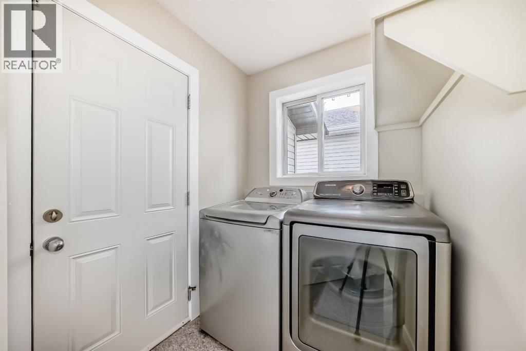 311 Rocky Ridge Cove NW, Calgary, Alberta T3G 4K1 - Photo 21 - A2300845