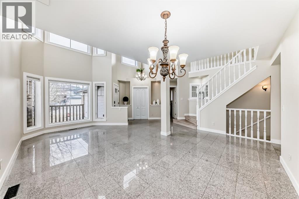 311 Rocky Ridge Cove NW, Calgary, Alberta T3G 4K1 - Photo 2 - A2300845