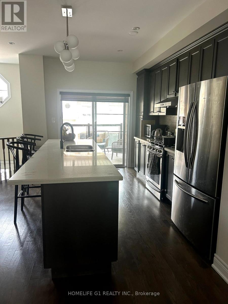 67 Dryden Way, Toronto, Ontario  M9R 0B2 - Photo 4 - W12993442