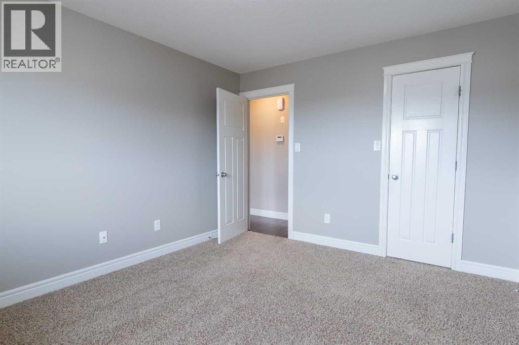 8, 895 Mount Sundance Manor W, Lethbridge, Alberta  T1J 1X7 - Photo 34 - A2291396