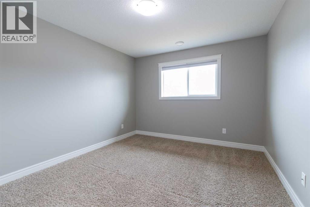 8, 895 Mount Sundance Manor W, Lethbridge, Alberta  T1J 1X7 - Photo 32 - A2291396