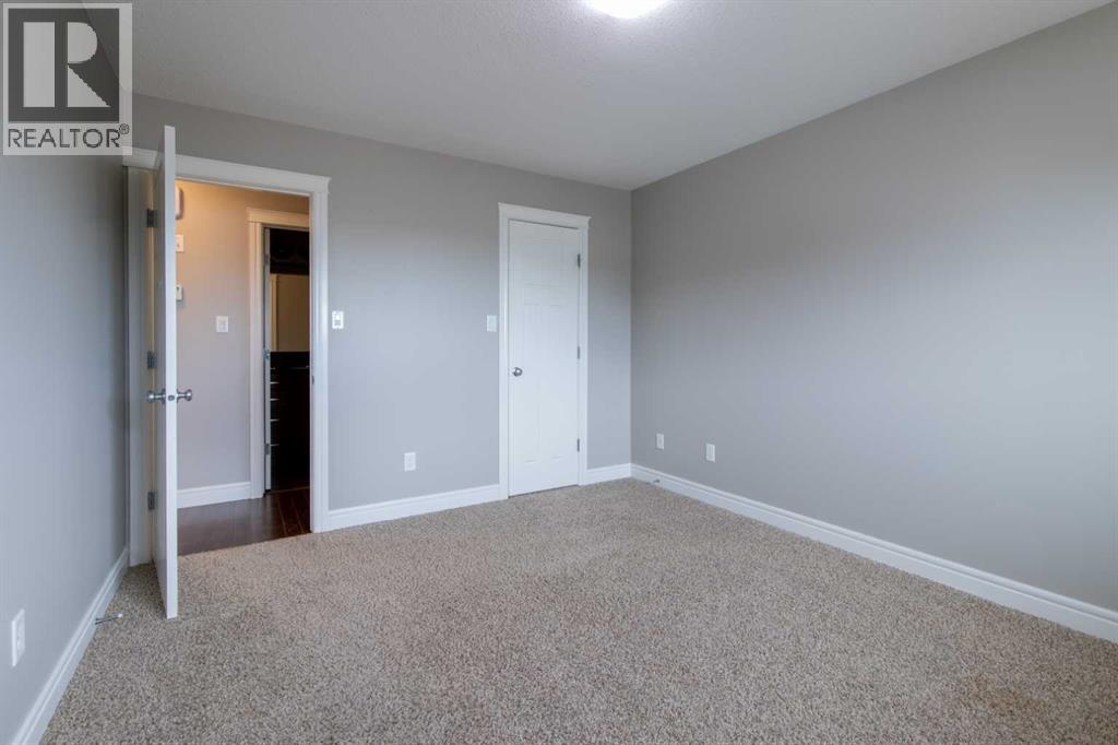 8, 895 Mount Sundance Manor W, Lethbridge, Alberta  T1J 1X7 - Photo 33 - A2291396