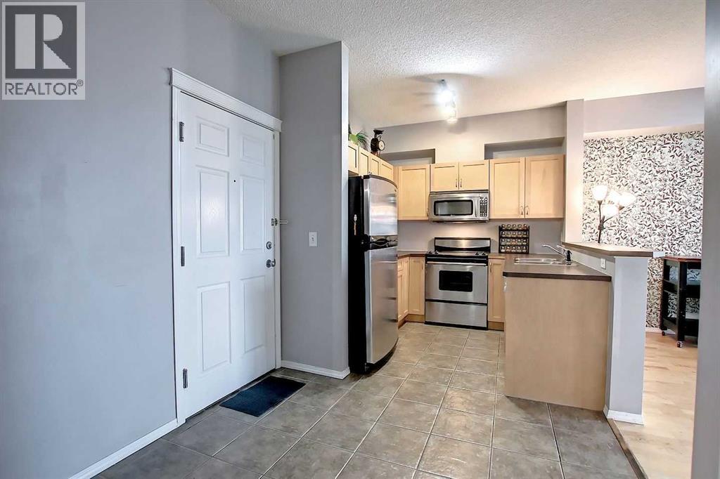 9303, 70 Panamount Drive Nw, Calgary, Alberta  T3K 6K6 - Photo 4 - A2293894