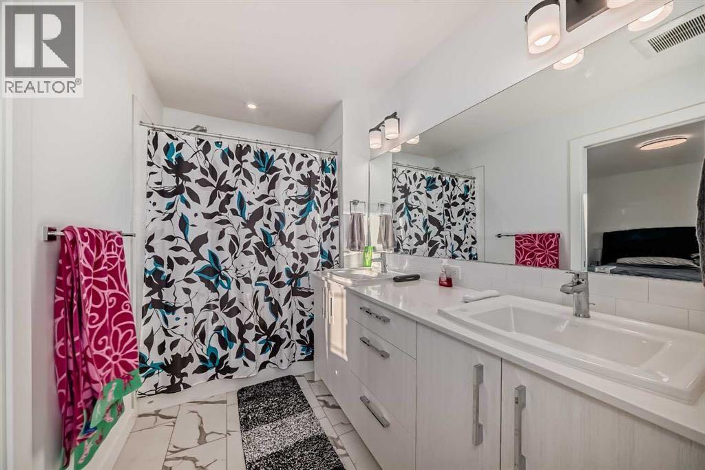 144 Merganser Drive W, Chestermere, Alberta T1X 2S5 - Photo 18 - A2301339