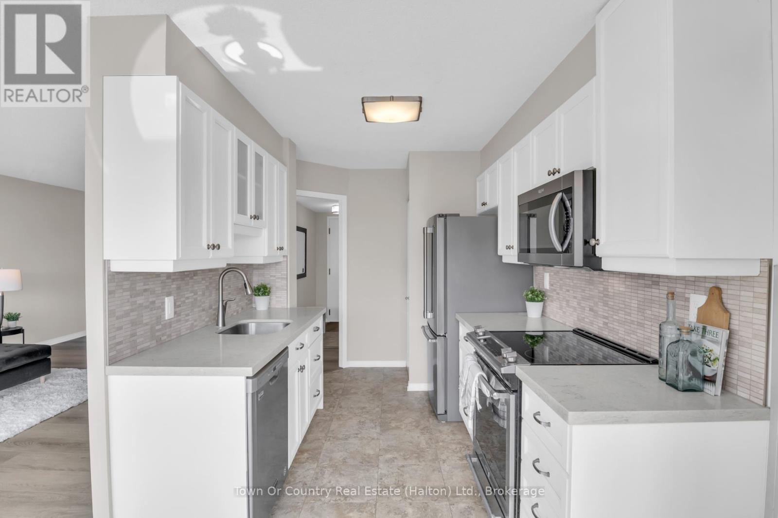 509 - 100 Millside Drive, Milton, Ontario  L9T 5E2 - Photo 13 - W13003136