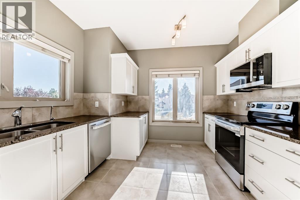 12 Cougar Ridge Landing Sw, Calgary, Alberta  T3H 0X8 - Photo 9 - A2277045