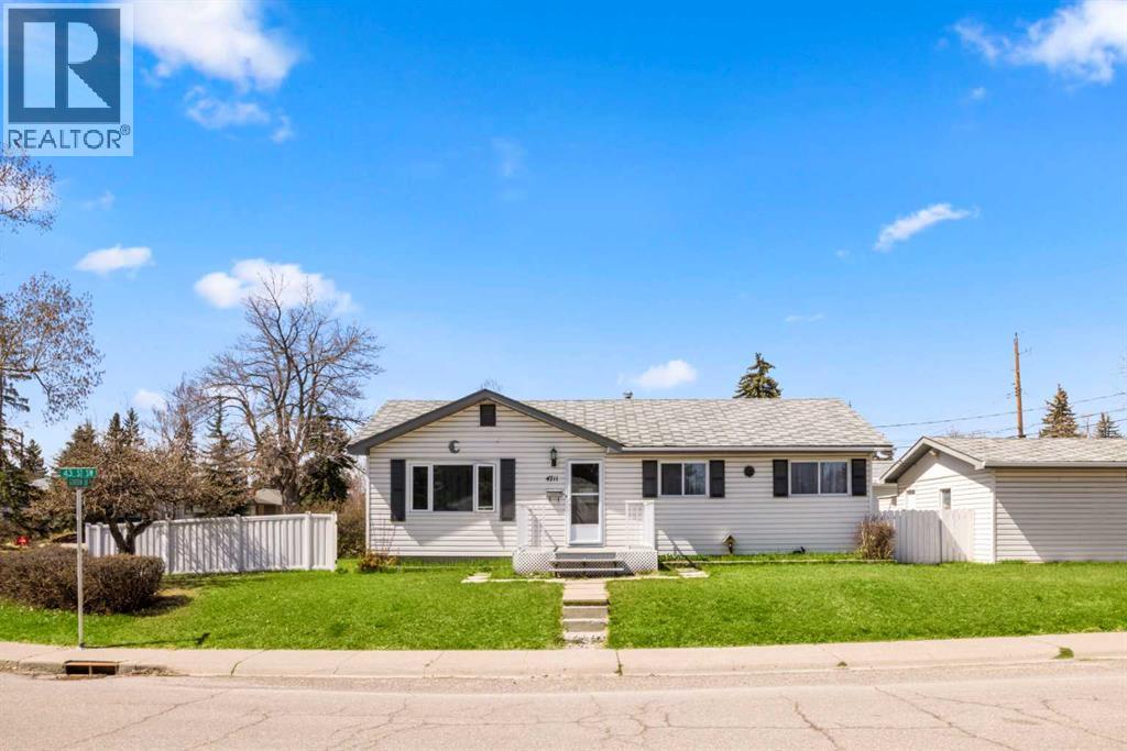 4711 43 Street SW, Calgary, Alberta  T3E 3P9 - Photo 1 - A2301919