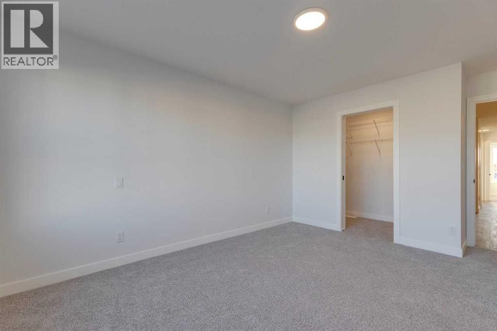 347 Fireside Drive, Cochrane, Alberta  T4C 3E1 - Photo 21 - A2278970