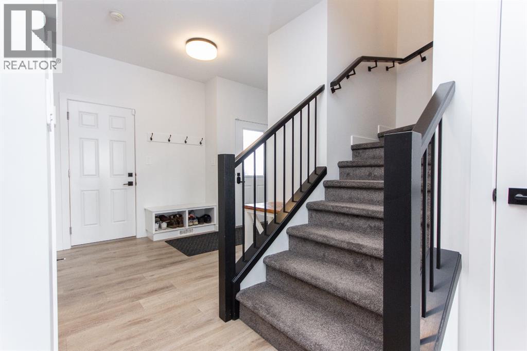 66 Henderson Crescent, Penhold, Alberta  T0M 1R0 - Photo 8 - A2290633