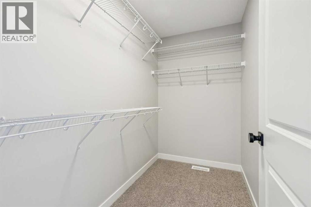 335 Fireside Drive, Cochrane, Alberta  T4C 3E1 - Photo 27 - A2300308