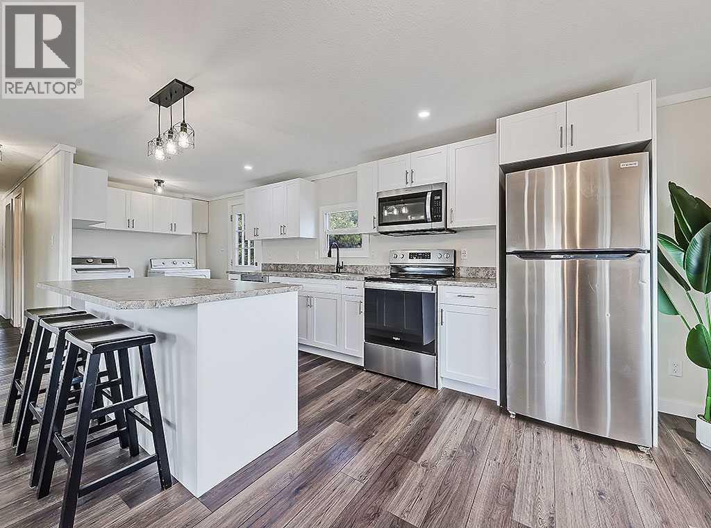 130 Sunset Way Ne, High River, Alberta T1V 1J4 - Photo 5 - A2268790