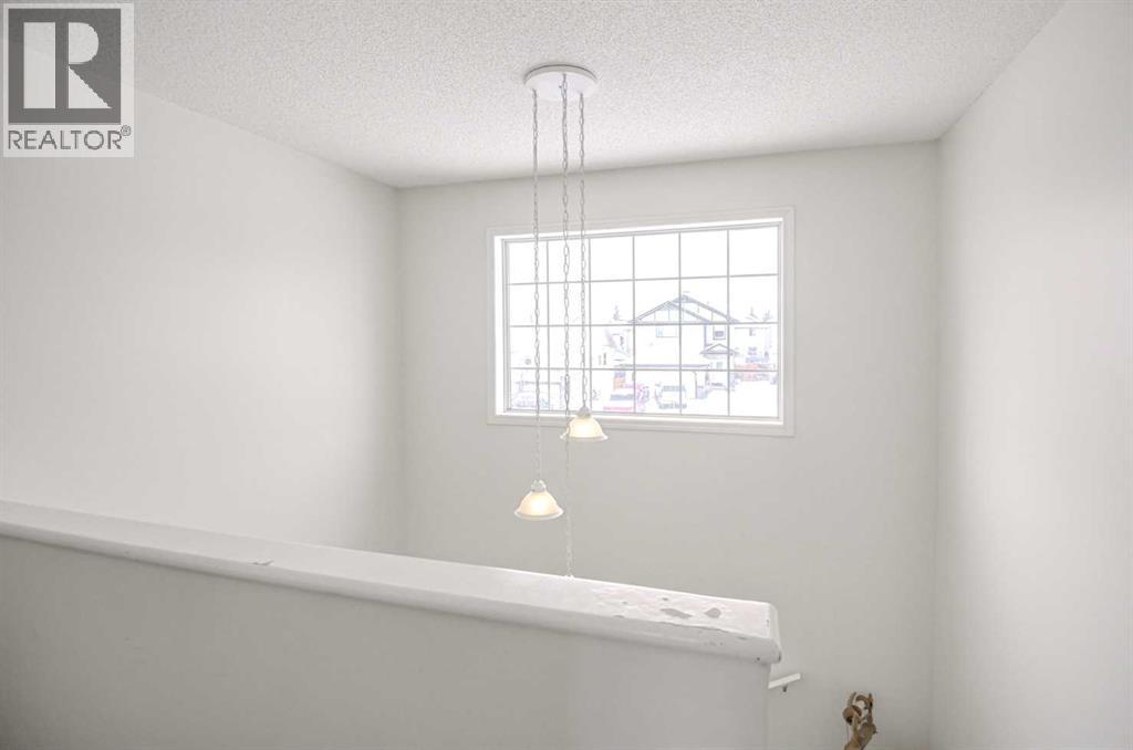 207 Crystalridge Place, Okotoks, Alberta  T1S 1T9 - Photo 16 - A2298825