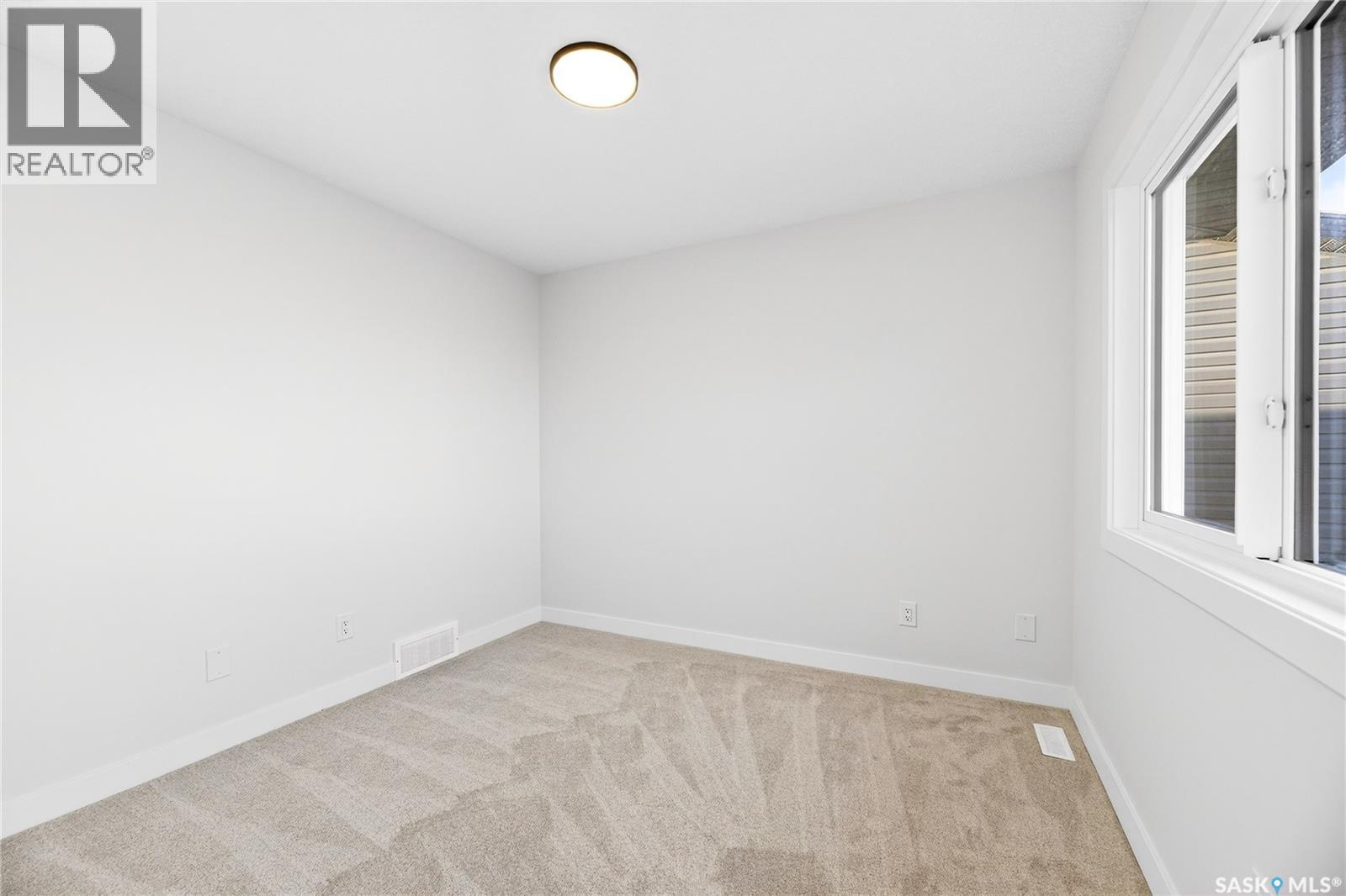 283 Nazarali Way, Saskatoon, Saskatchewan  S7V 1X6 - Photo 38 - SK030573