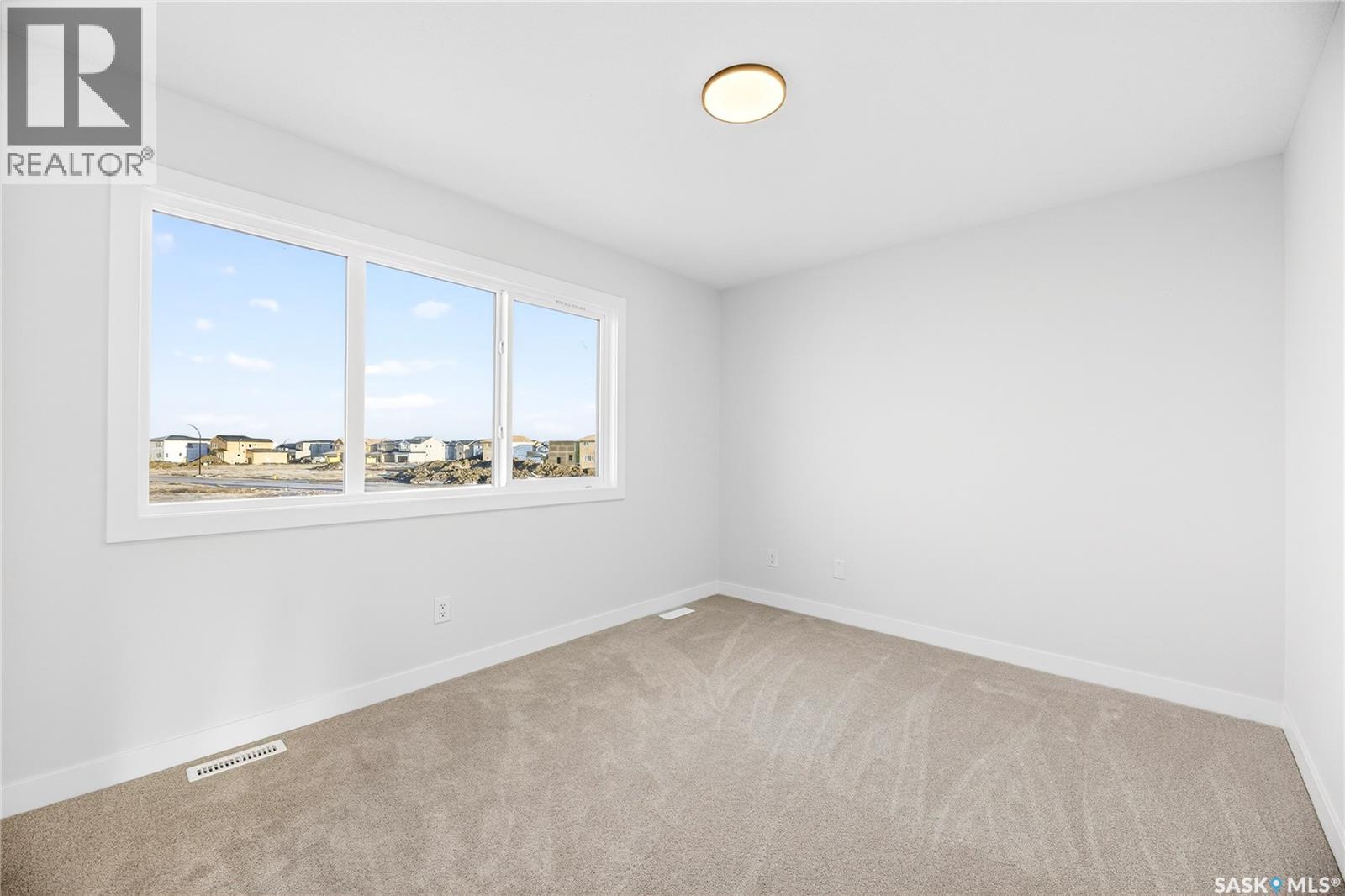 283 Nazarali Way, Saskatoon, Saskatchewan  S7V 1X6 - Photo 40 - SK030573