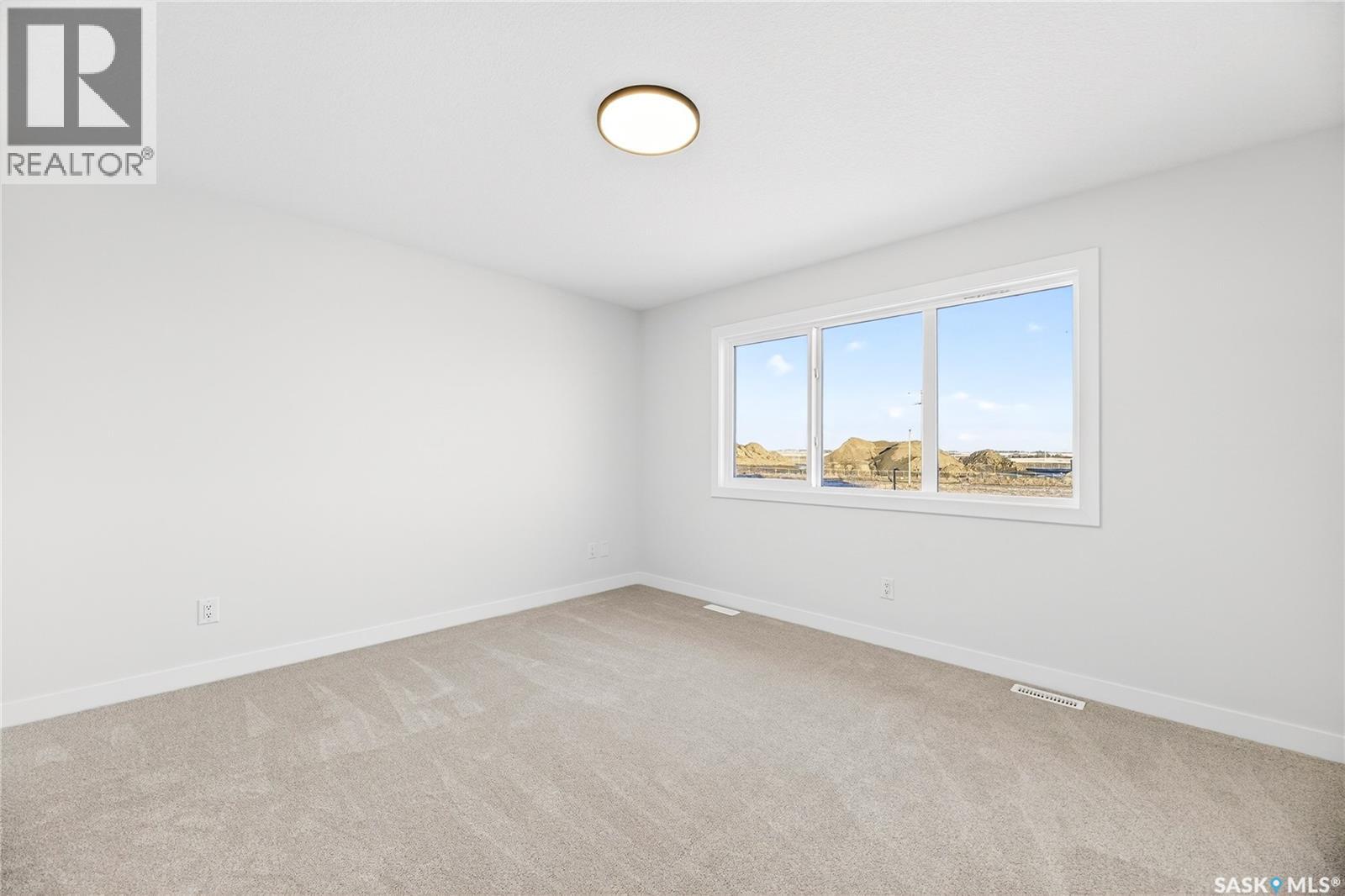 283 Nazarali Way, Saskatoon, Saskatchewan  S7V 1X6 - Photo 29 - SK030573