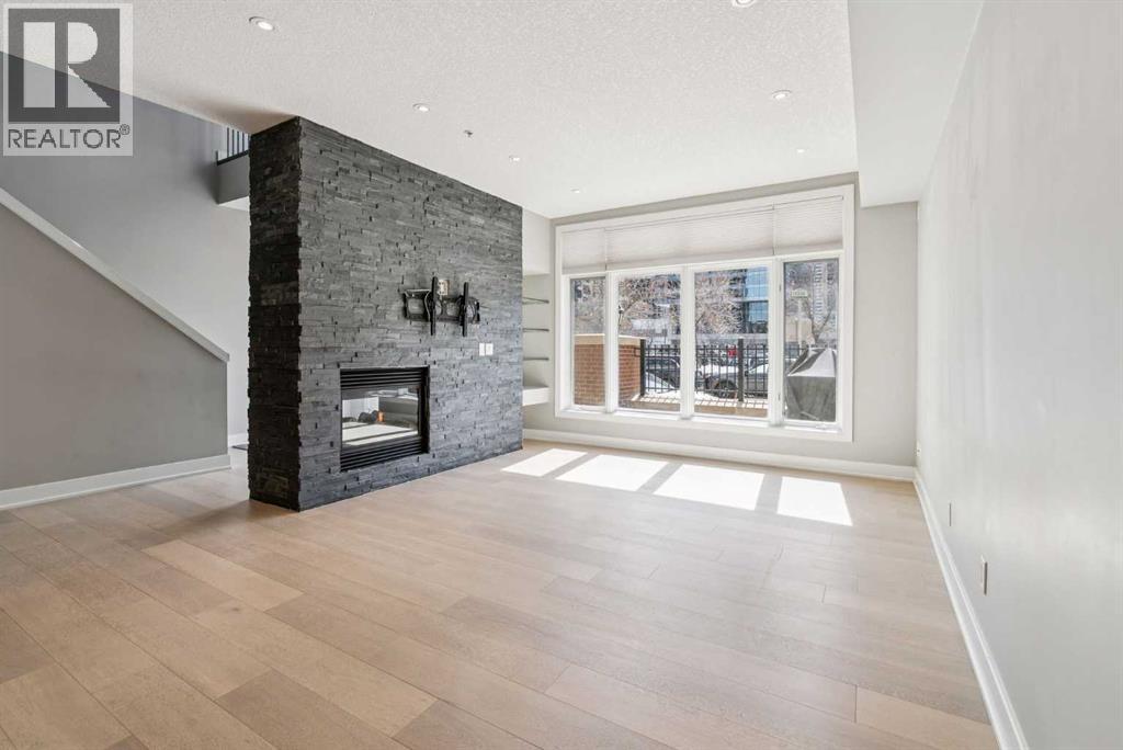 103, 660 Eau Claire Avenue SW, Calgary, Alberta  T2P 5K3 - Photo 4 - A2299710