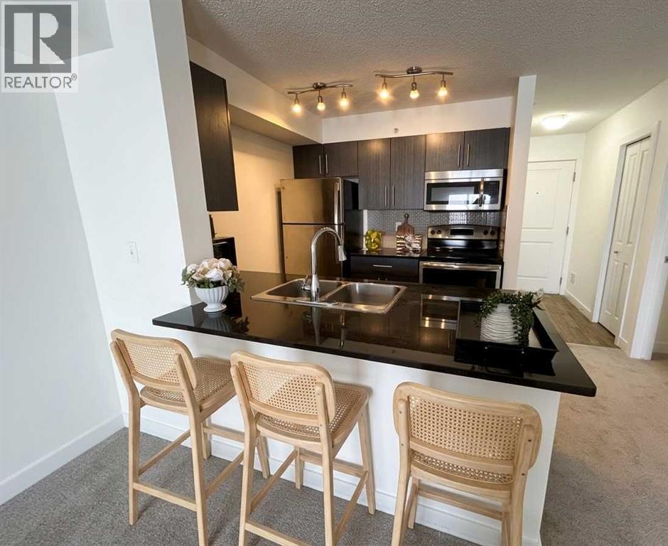412, 5 Saddlestone Way Ne, Calgary, Alberta  T3J 0S2 - Photo 3 - A2299903