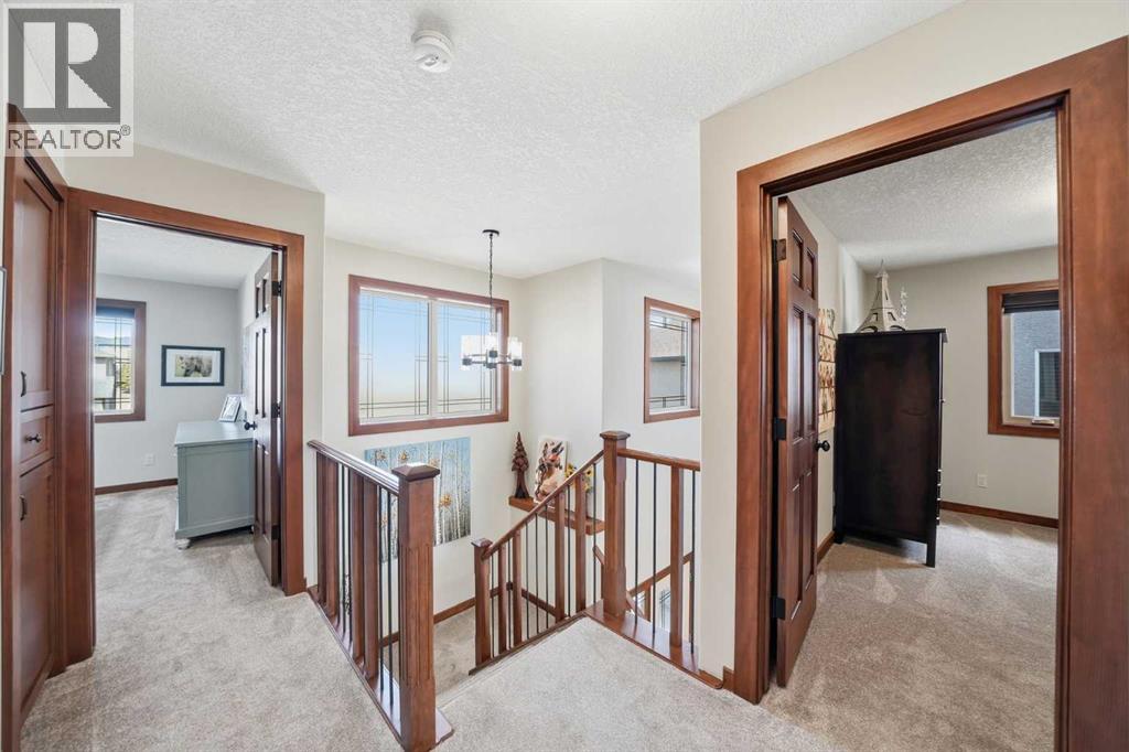 185 Sunset Circle, Cochrane, Alberta  T4C 0C5 - Photo 28 - A2300315