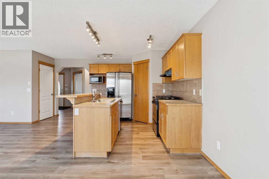 111 Luxstone Crescent SW, Airdrie, Alberta  T4B 2W8 - Photo 11 - A2301491