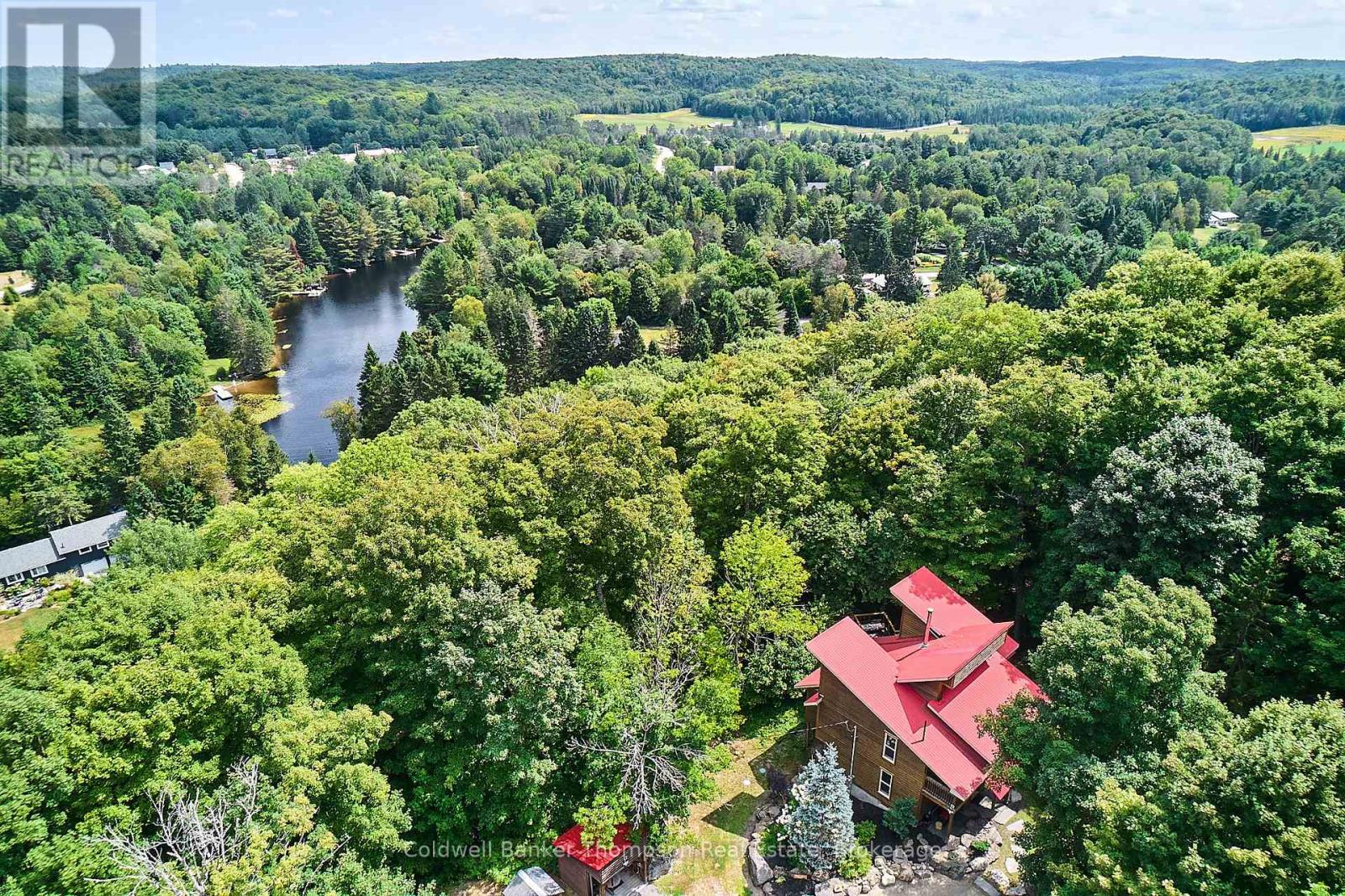 <div class="slider-price">$1,089,000</div><p>869 North Mary Lake Road, Huntsville, Ontario</p>