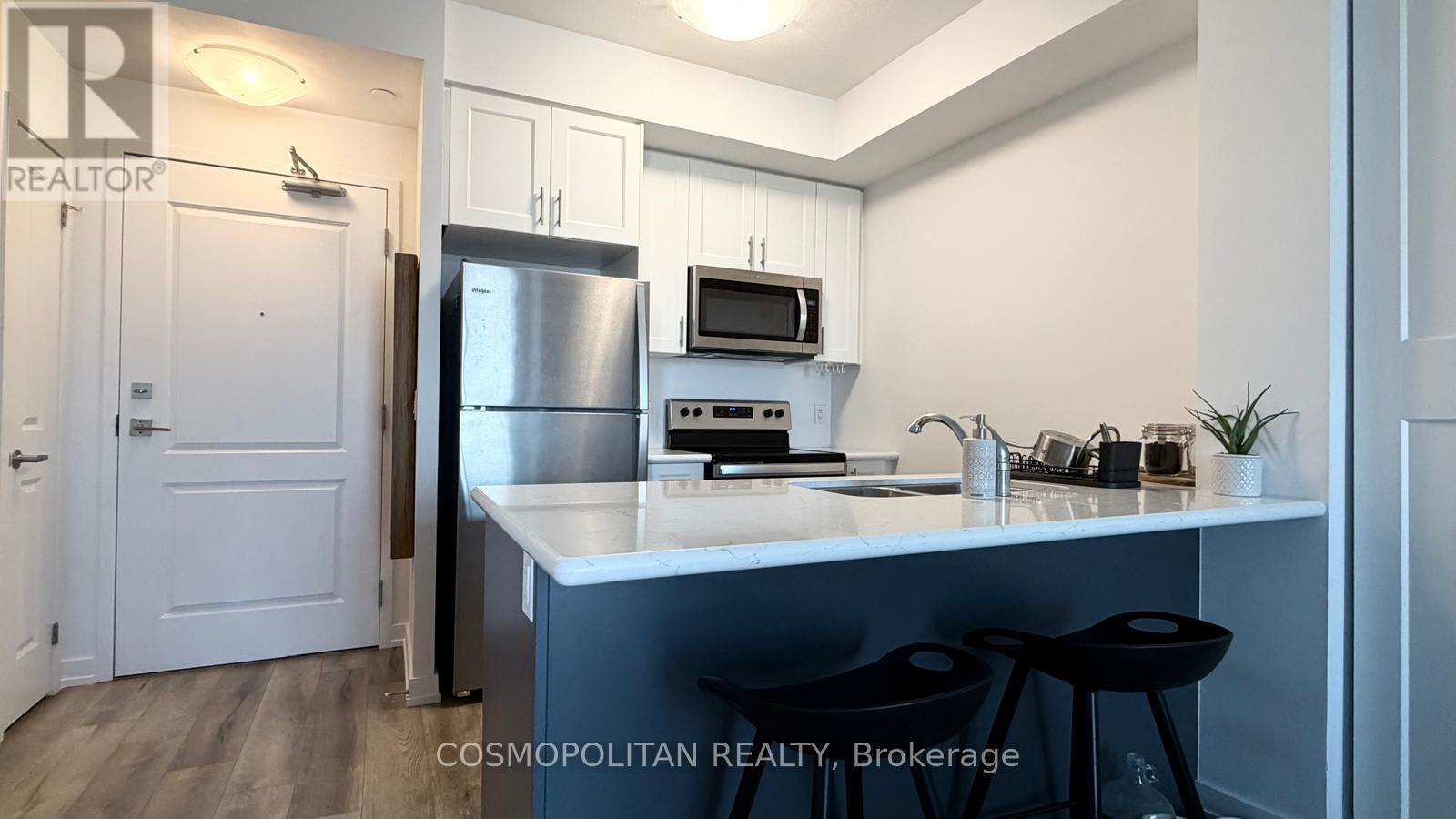 212 - 5055 Greenlane Road, Lincoln, Ontario  L3J 2J3 - Photo 1 - X12856972