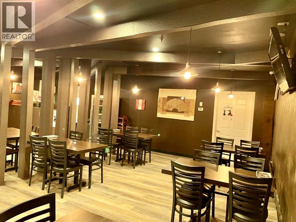 9 West End Avenue SW, Calgary, Alberta  T2P 1A5 - Photo 1 - A2302438