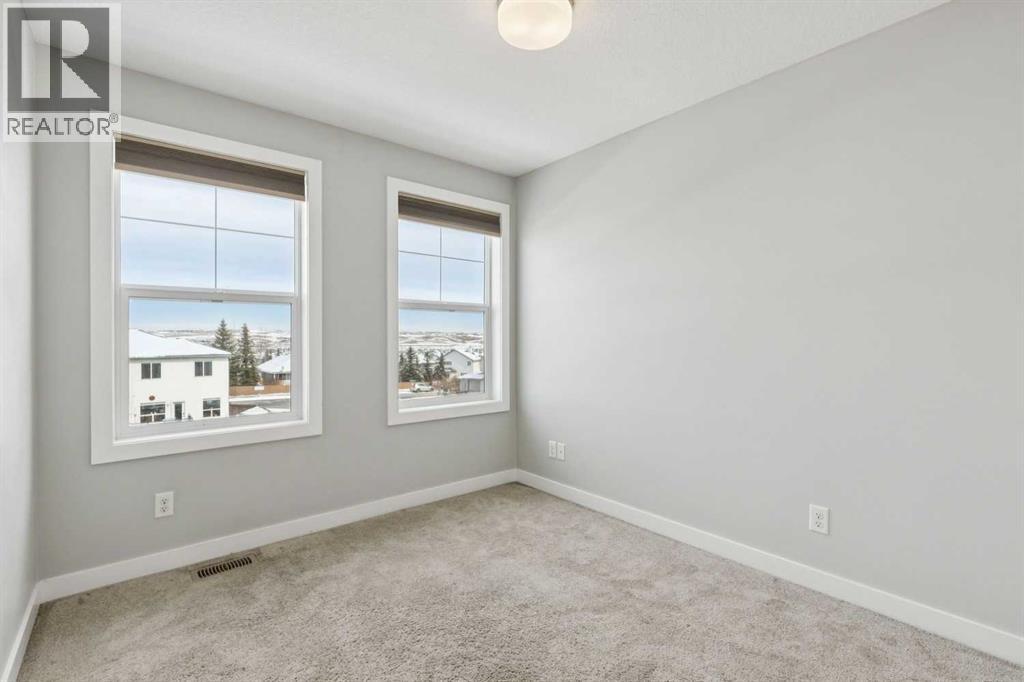 2506 Jumping Pound Common, Cochrane, Alberta  T4C 2L1 - Photo 19 - A2297101