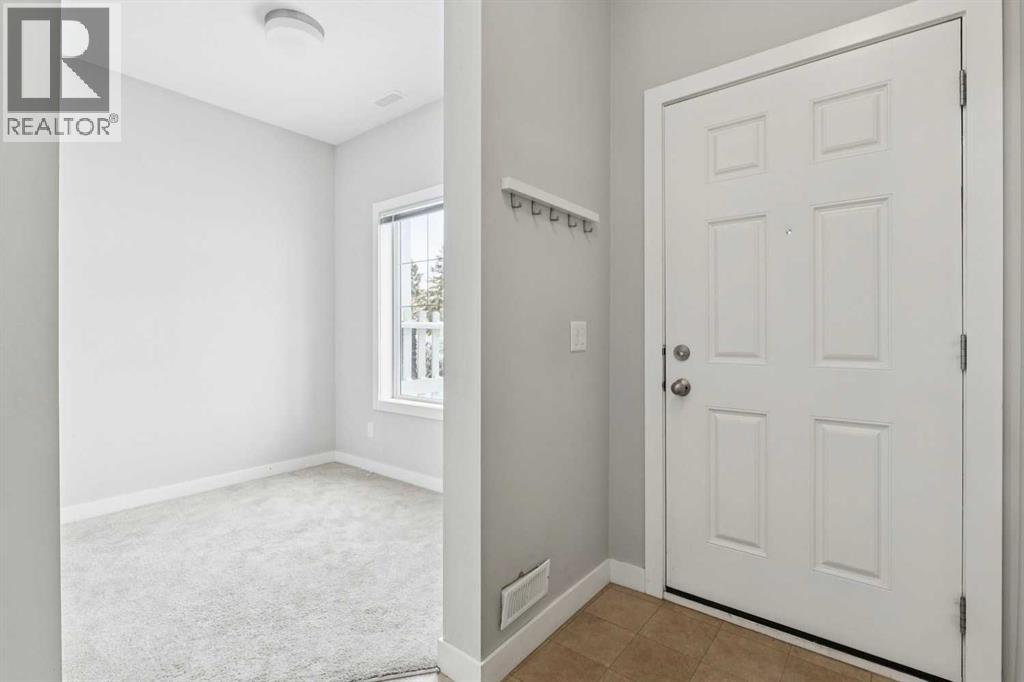 2506 Jumping Pound Common, Cochrane, Alberta  T4C 2L1 - Photo 3 - A2297101