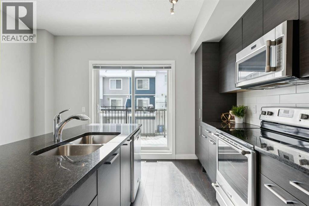 2506 Jumping Pound Common, Cochrane, Alberta  T4C 2L1 - Photo 8 - A2297101