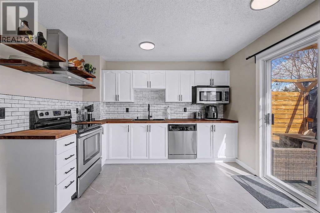 339 Coverdale Court Ne, Calgary, Alberta  T3K 4J8 - Photo 12 - A2301351