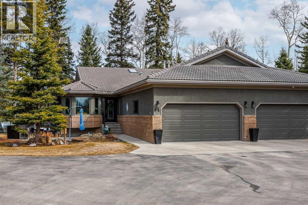 94 Sunset Way, Priddis Greens, Alberta  T0L 1W3 - Photo 1 - A2302298