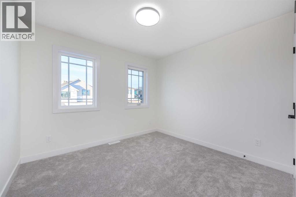 108 Heritage Manor, Cochrane, Alberta  T4C 3K8 - Photo 25 - A2290928